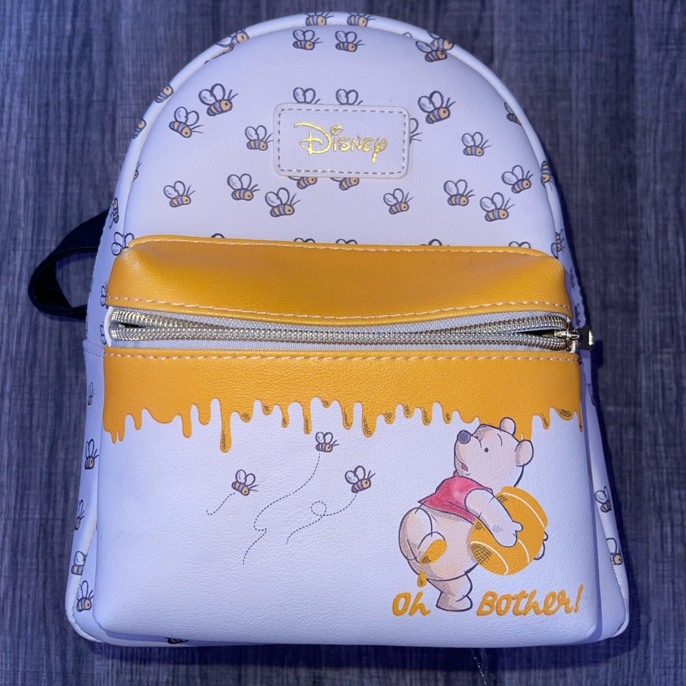 Selling a very cute Winnie the  Pooh backpack !!